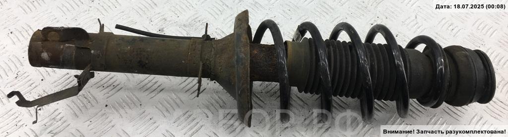 Амортизатор передний левый