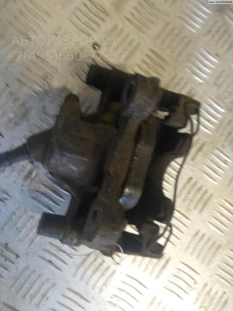 Суппорт задний левый