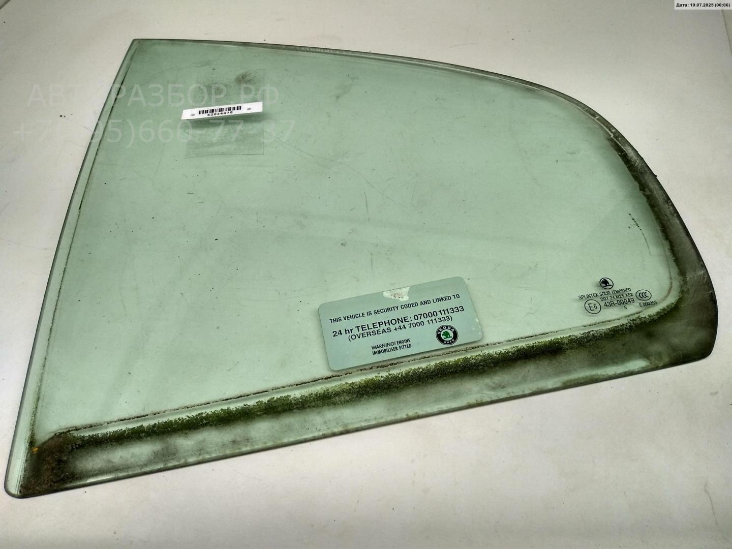 Стекло двери задней левой (форточка)