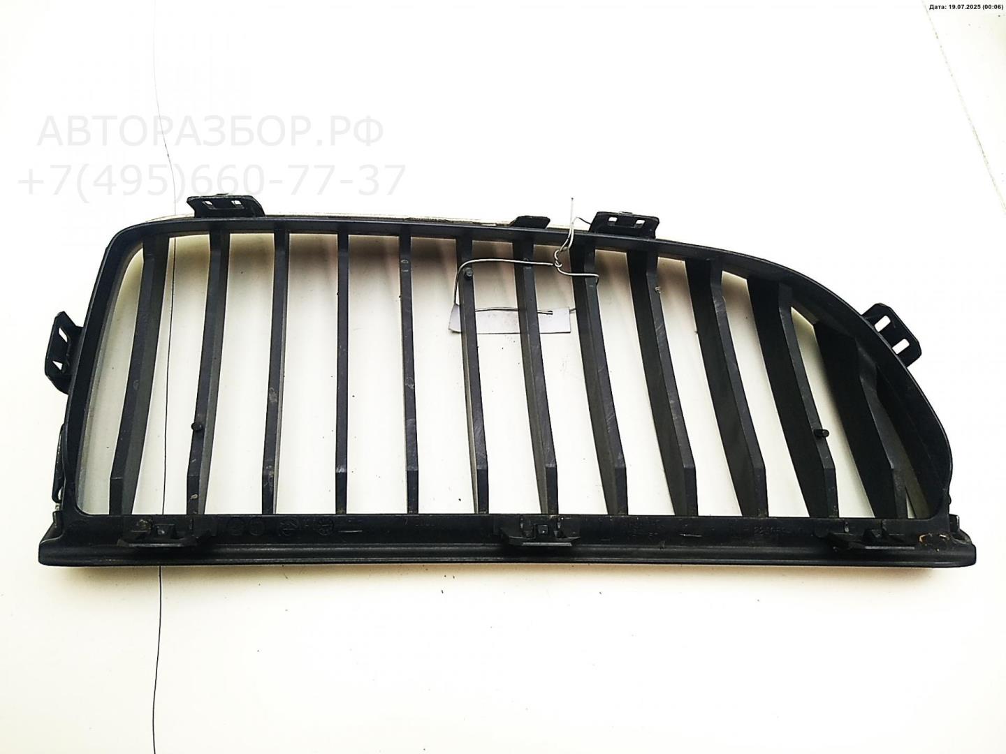 Решетка радиатора левая