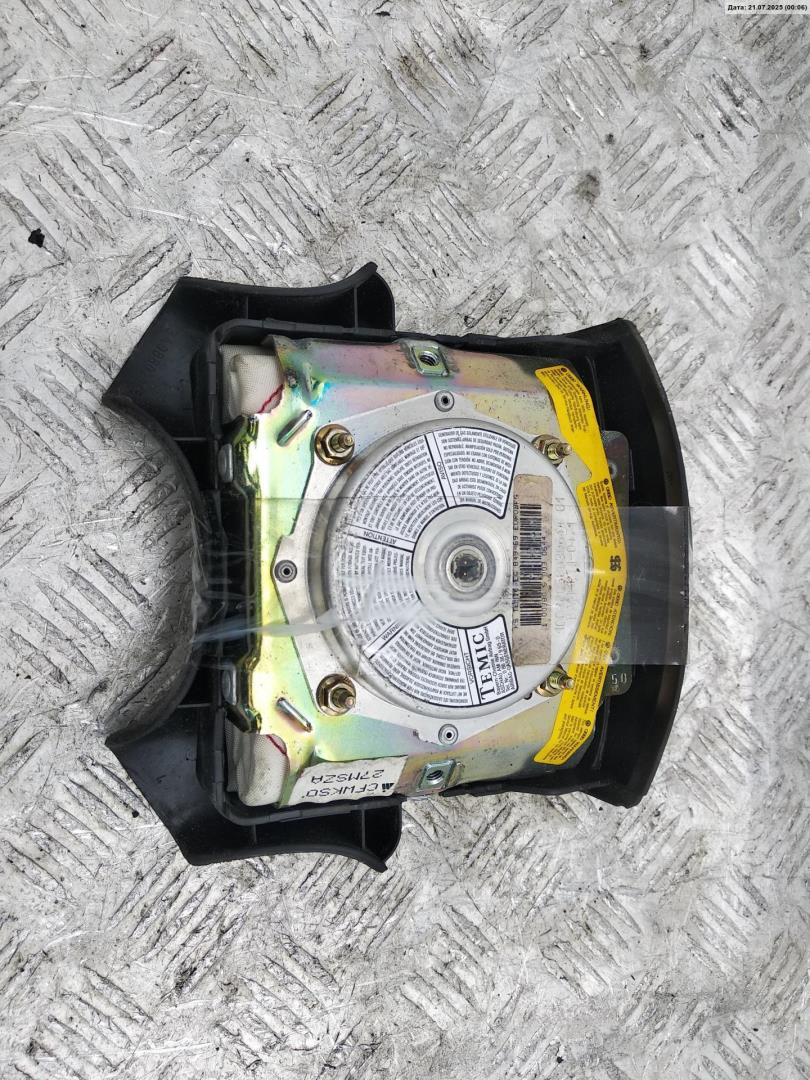 Подушка безопасности в рулевое колесо