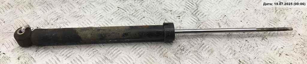 Амортизатор задний левый