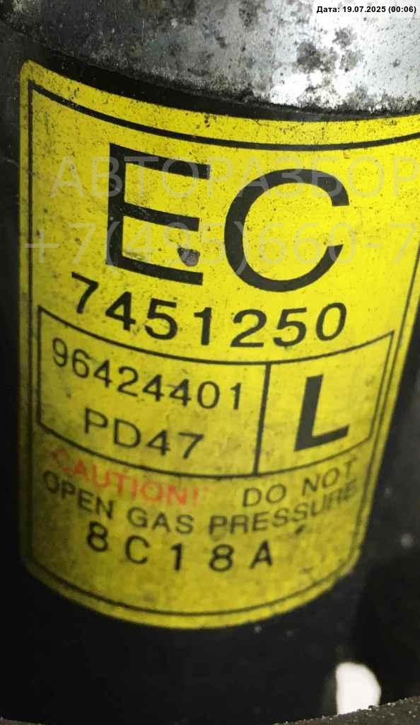 Амортизатор передний левый