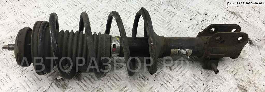 Амортизатор передний левый