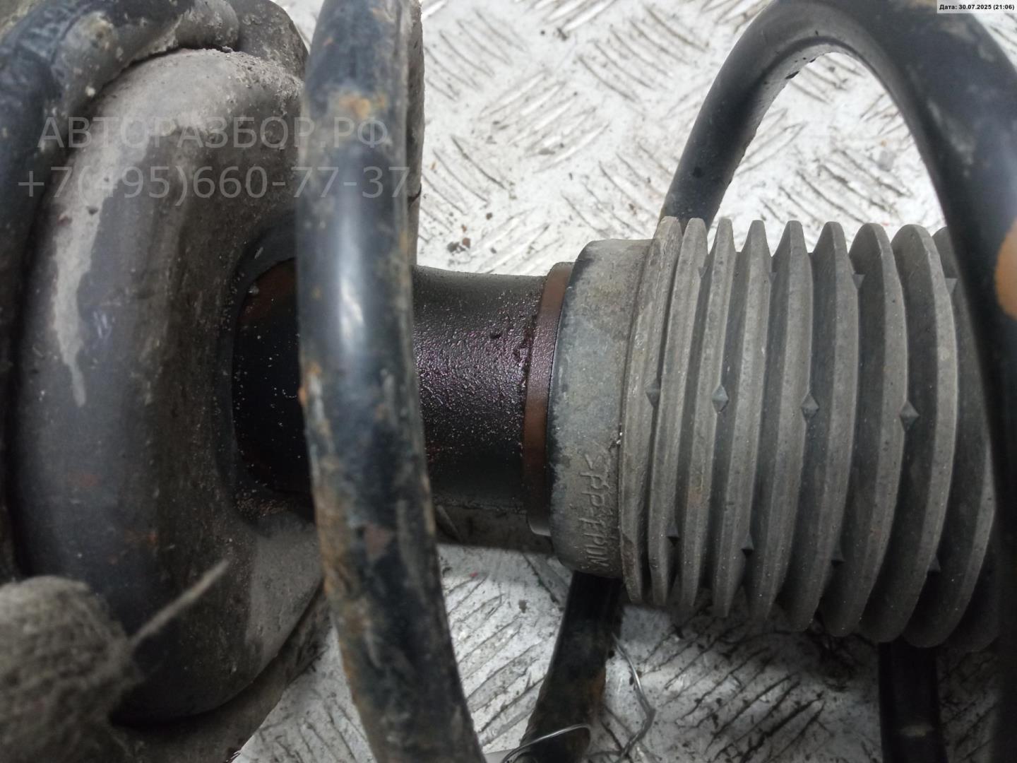 Амортизатор задний левый