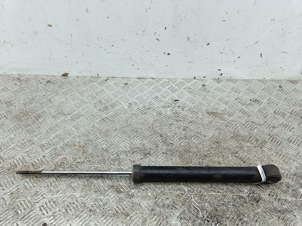 Амортизатор задний левый