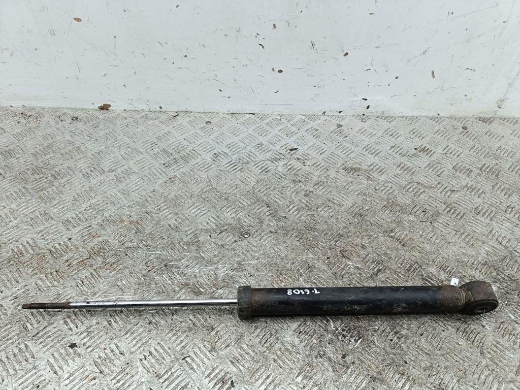 Амортизатор задний левый