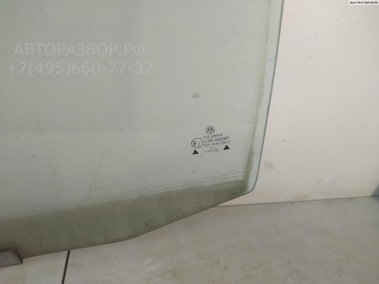 Стекло двери задней левой