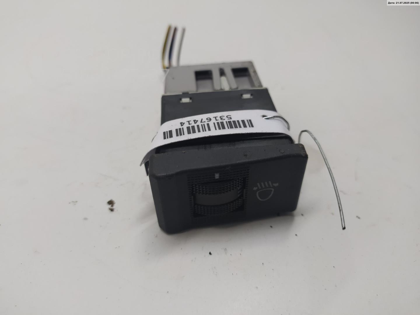 Кнопка корректора фар