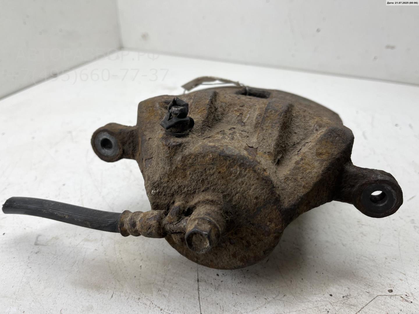 Суппорт передний левый