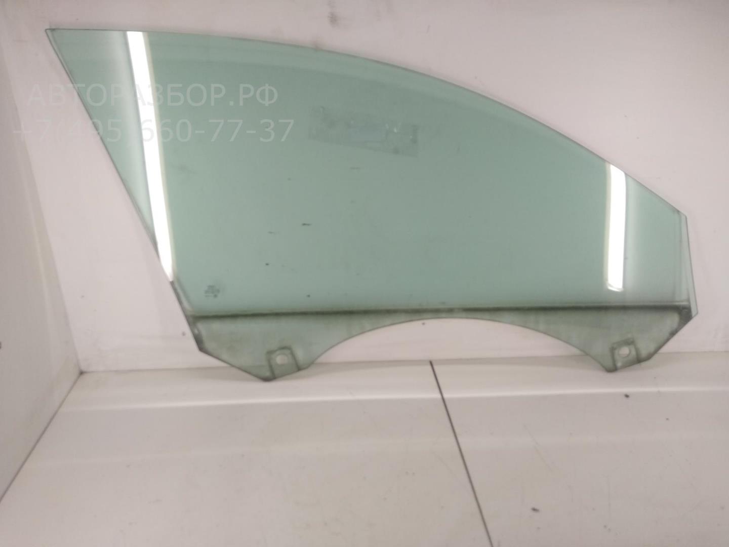 Стекло двери передней левой