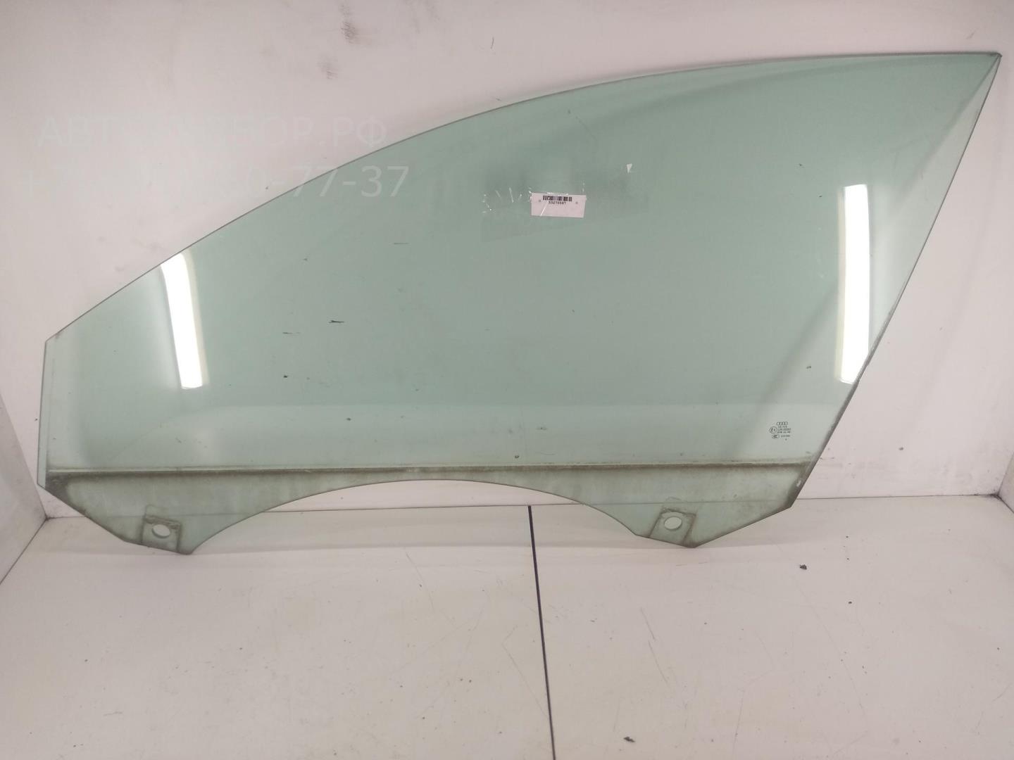 Стекло двери передней левой