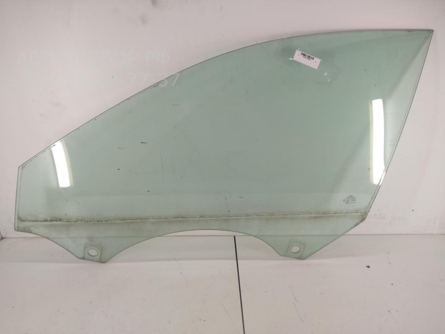 Стекло двери передней левой