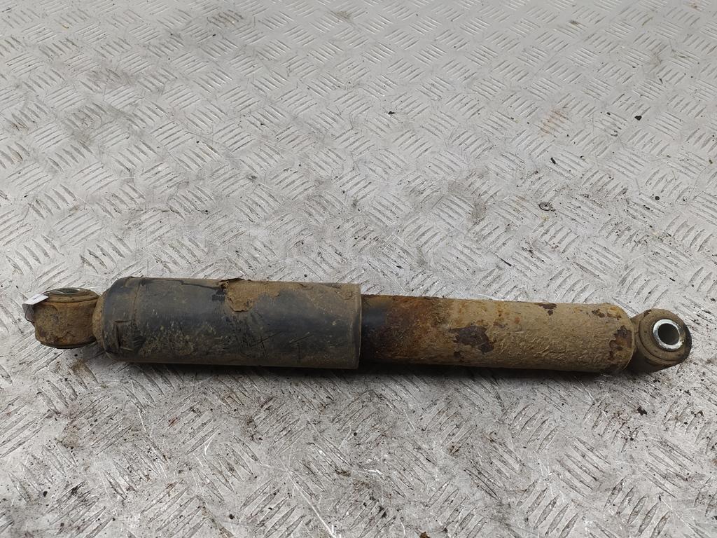 Амортизатор задний левый