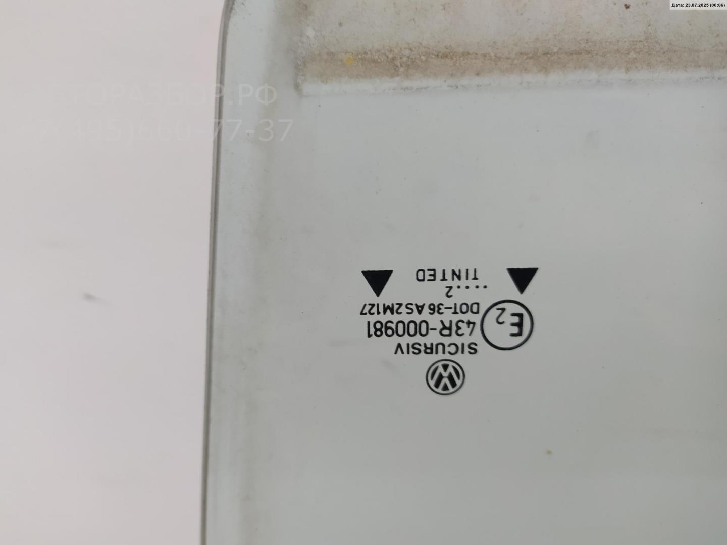 Стекло двери задней левой