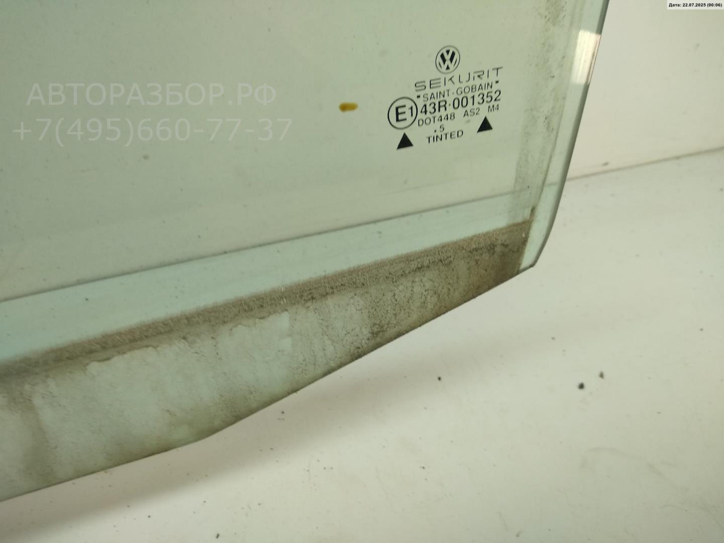 Стекло двери задней левой