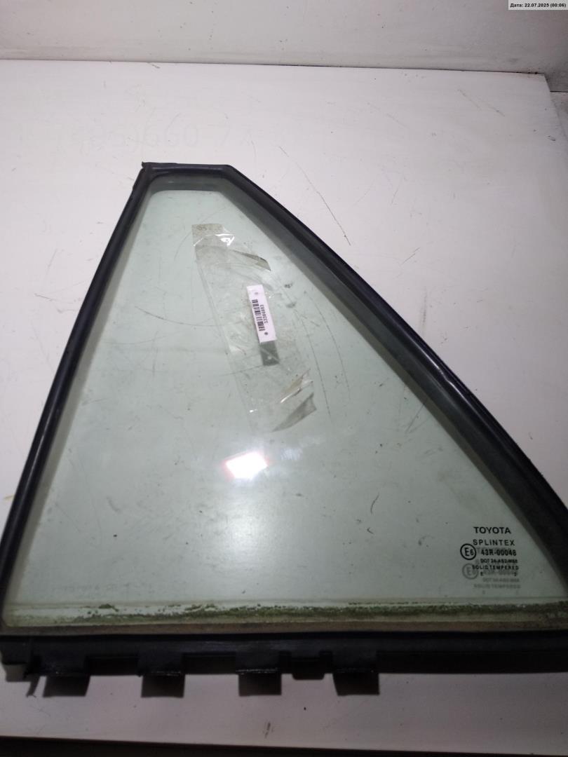Стекло двери задней левой (форточка)