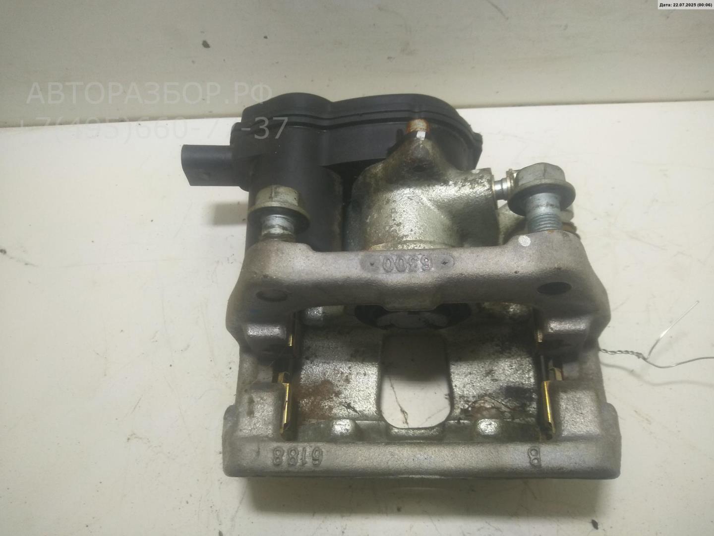 Суппорт задний левый