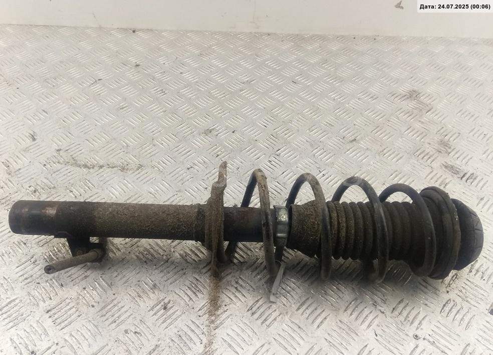 Амортизатор передний левый
