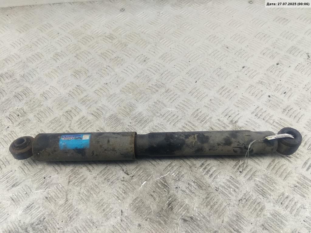 Амортизатор задний левый