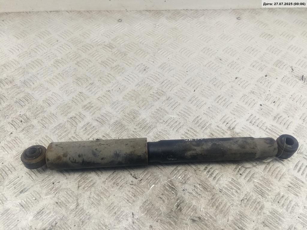 Амортизатор задний левый