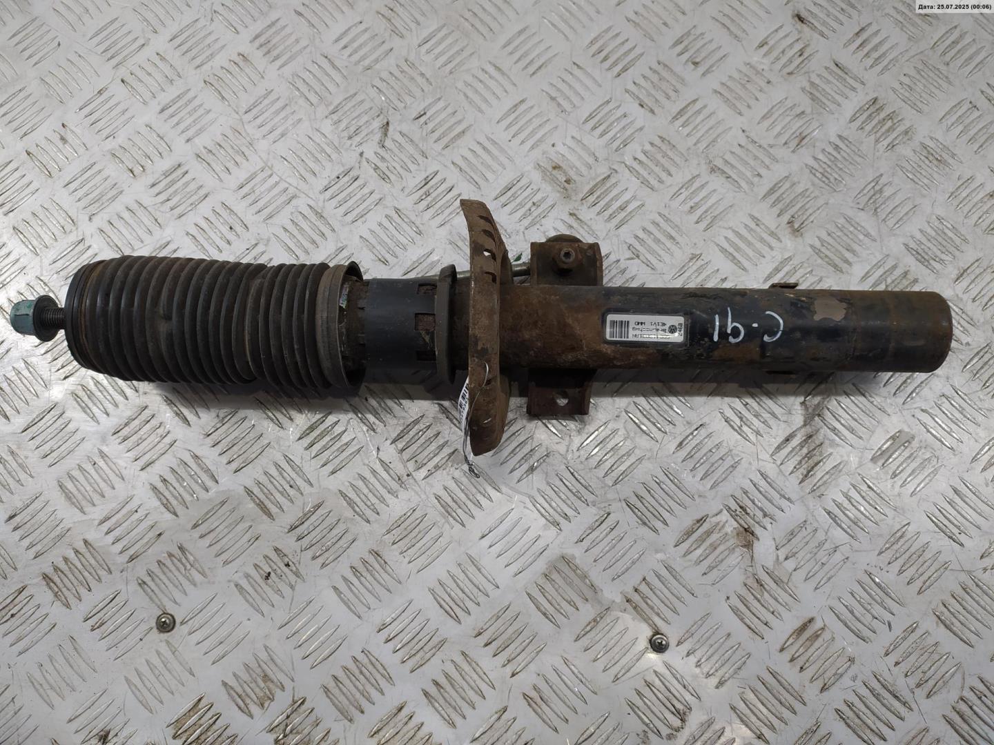 Амортизатор передний левый