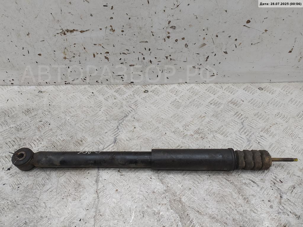 Амортизатор задний левый