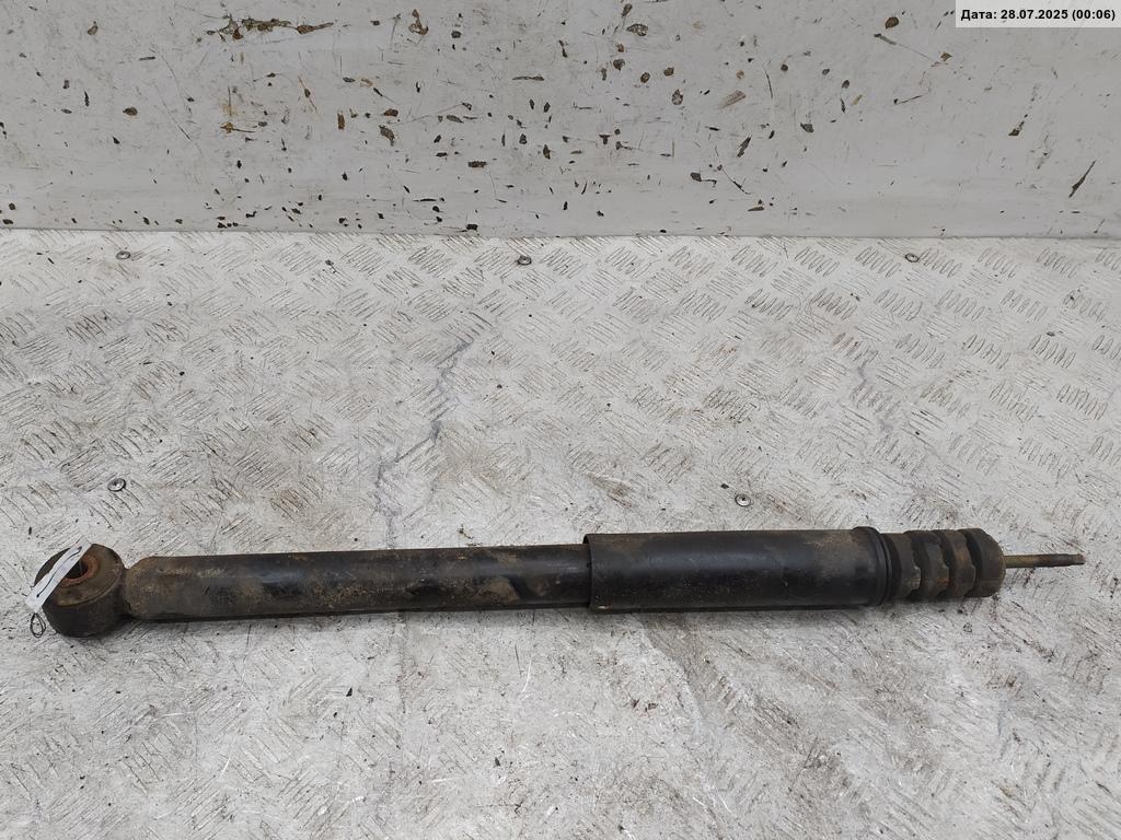 Амортизатор задний левый