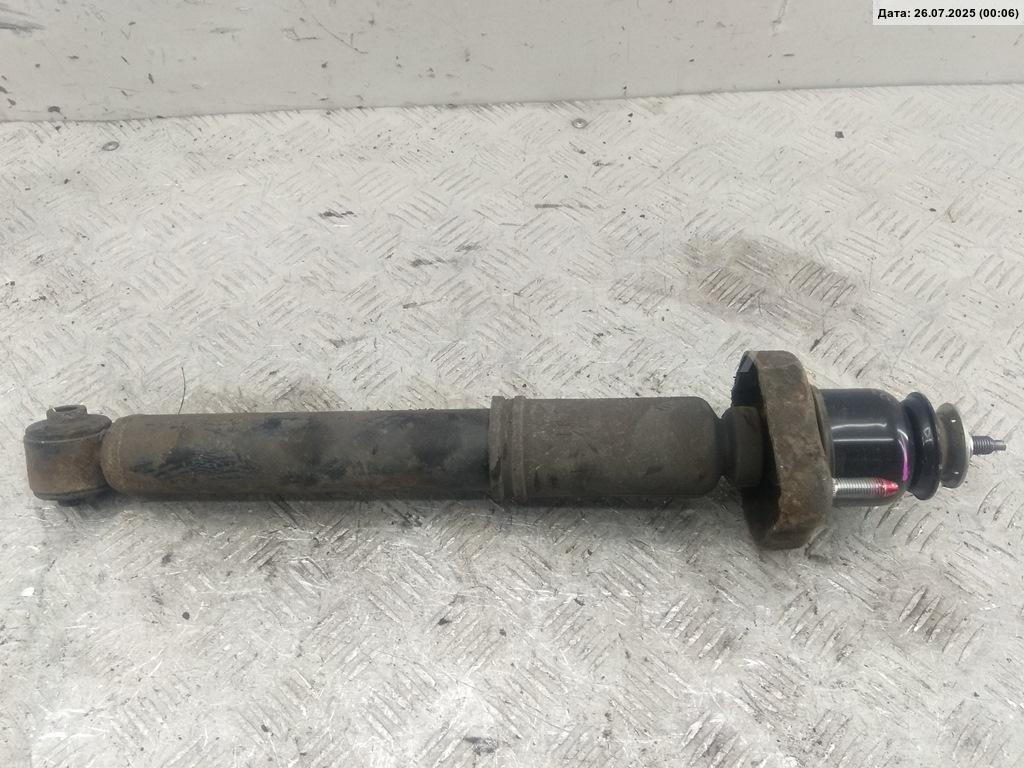 Амортизатор задний левый