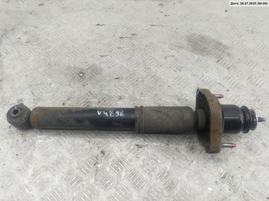 Амортизатор задний левый