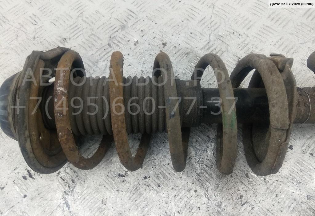 Амортизатор передний левый