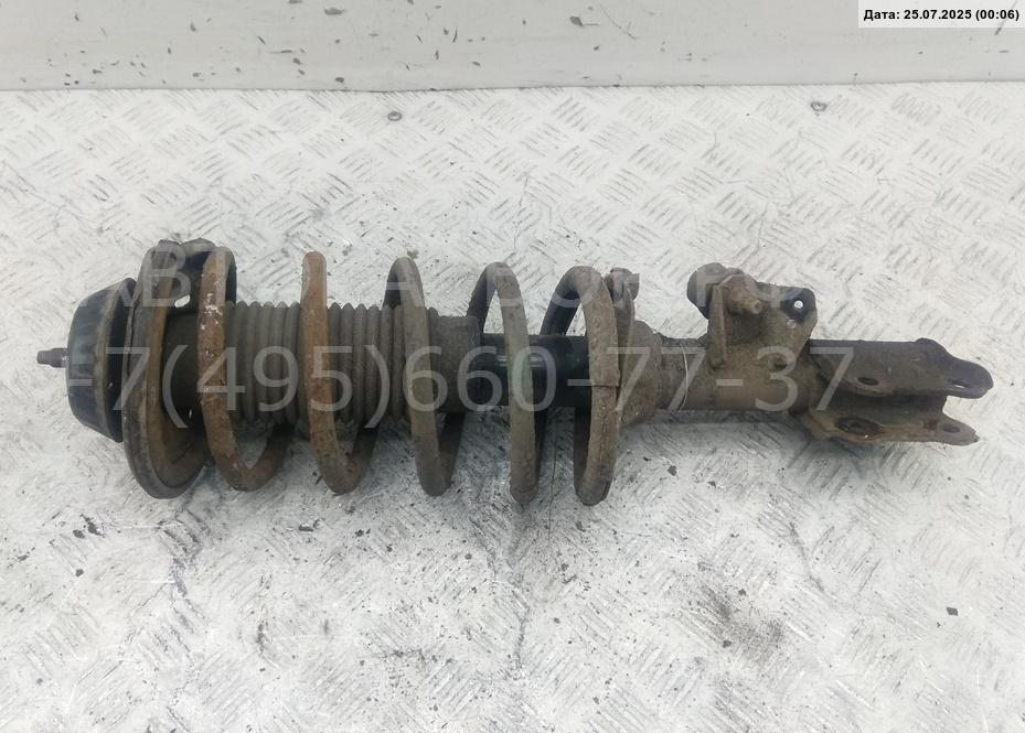 Амортизатор передний левый