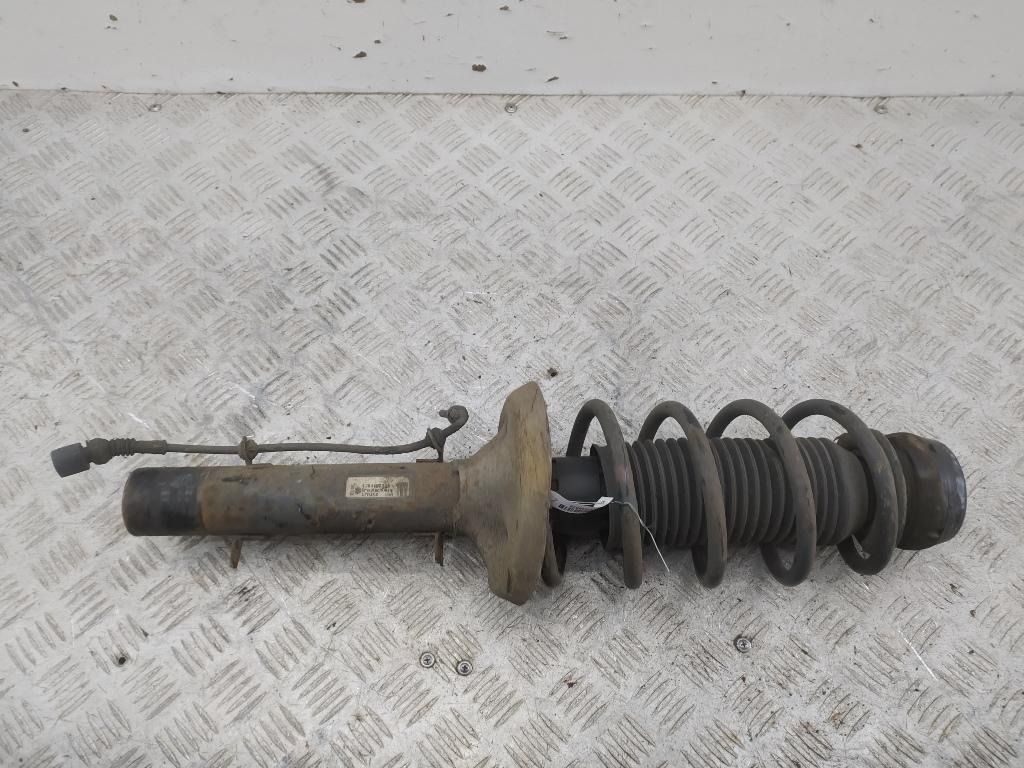 Амортизатор передний левый