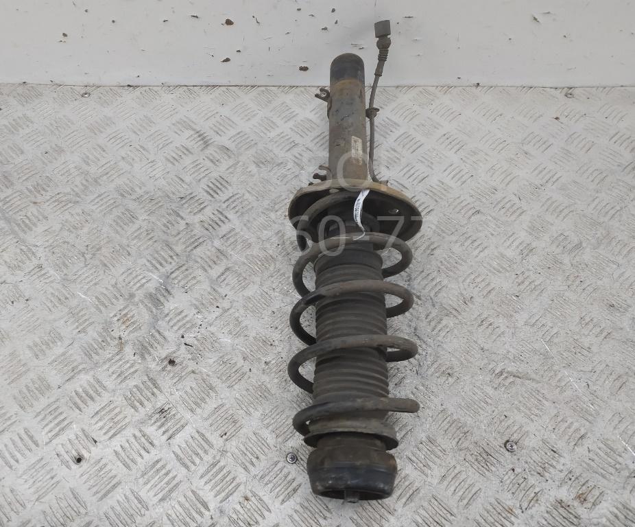 Амортизатор передний левый