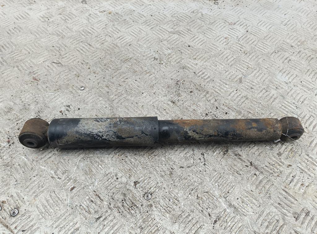 Амортизатор задний левый