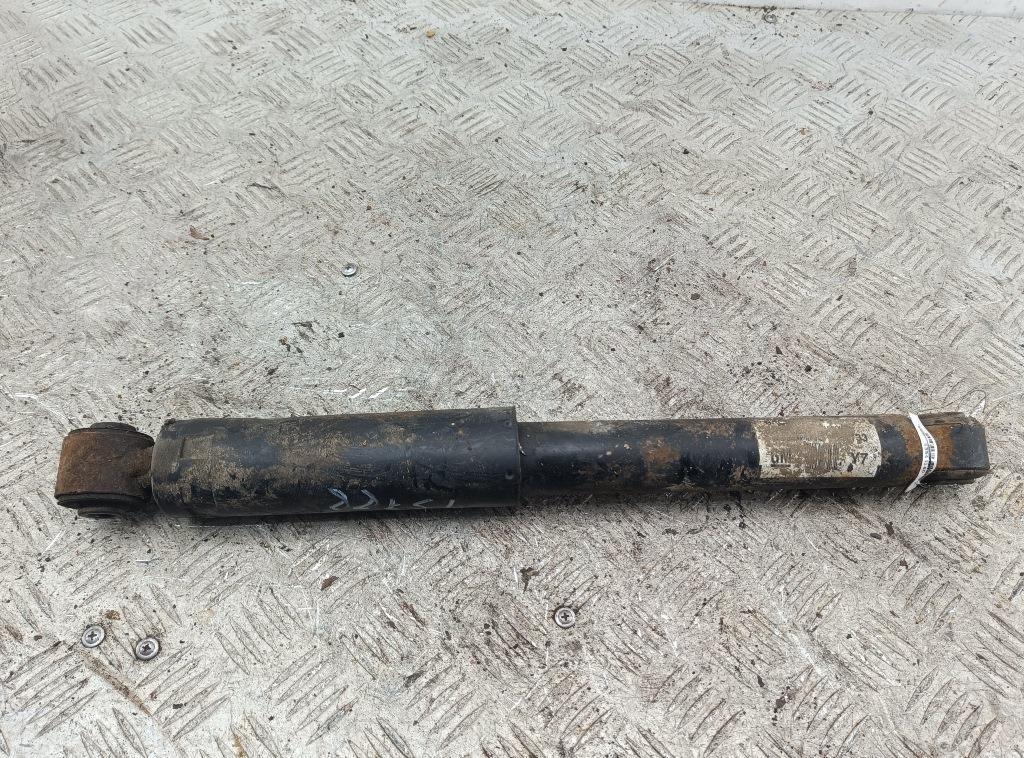 Амортизатор задний левый