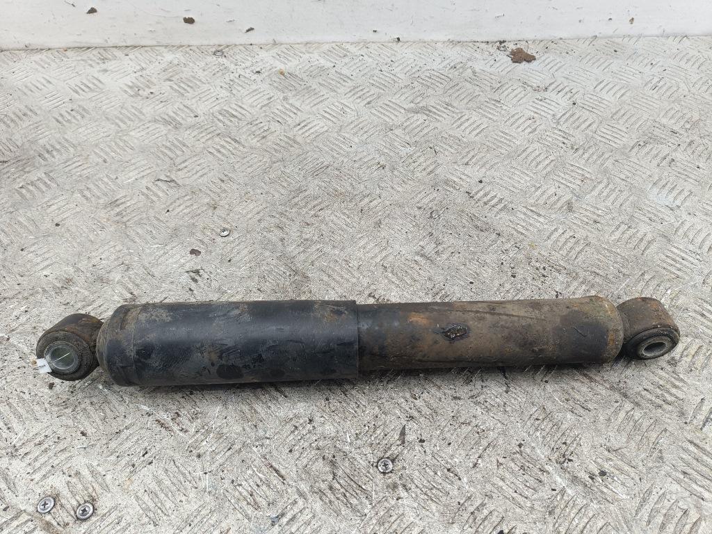 Амортизатор задний левый