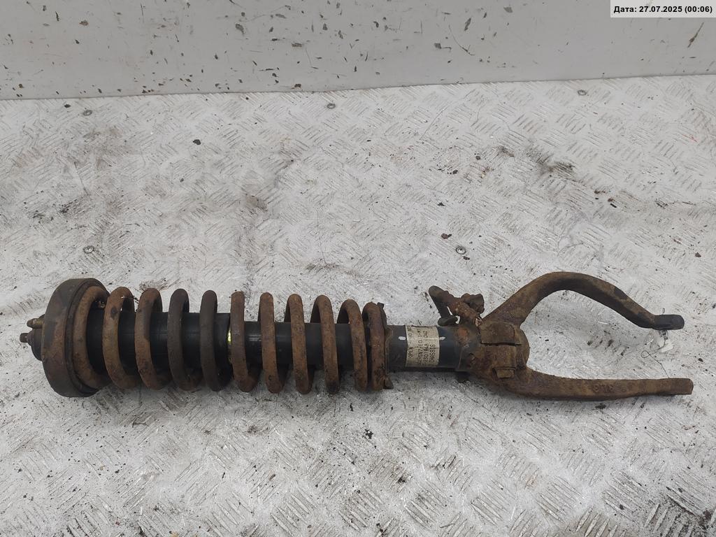 Амортизатор передний левый