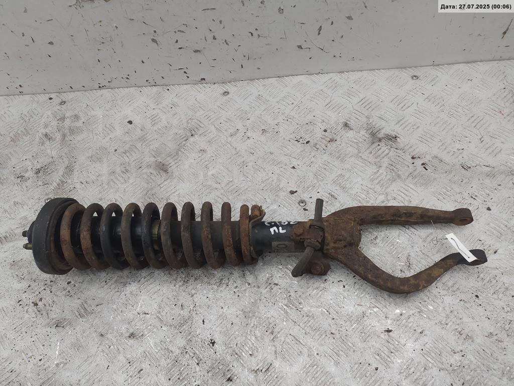 Амортизатор передний левый