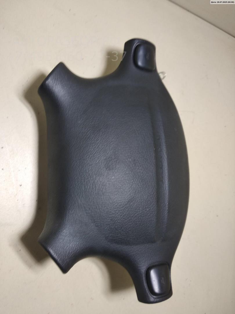 Подушка безопасности в рулевое колесо