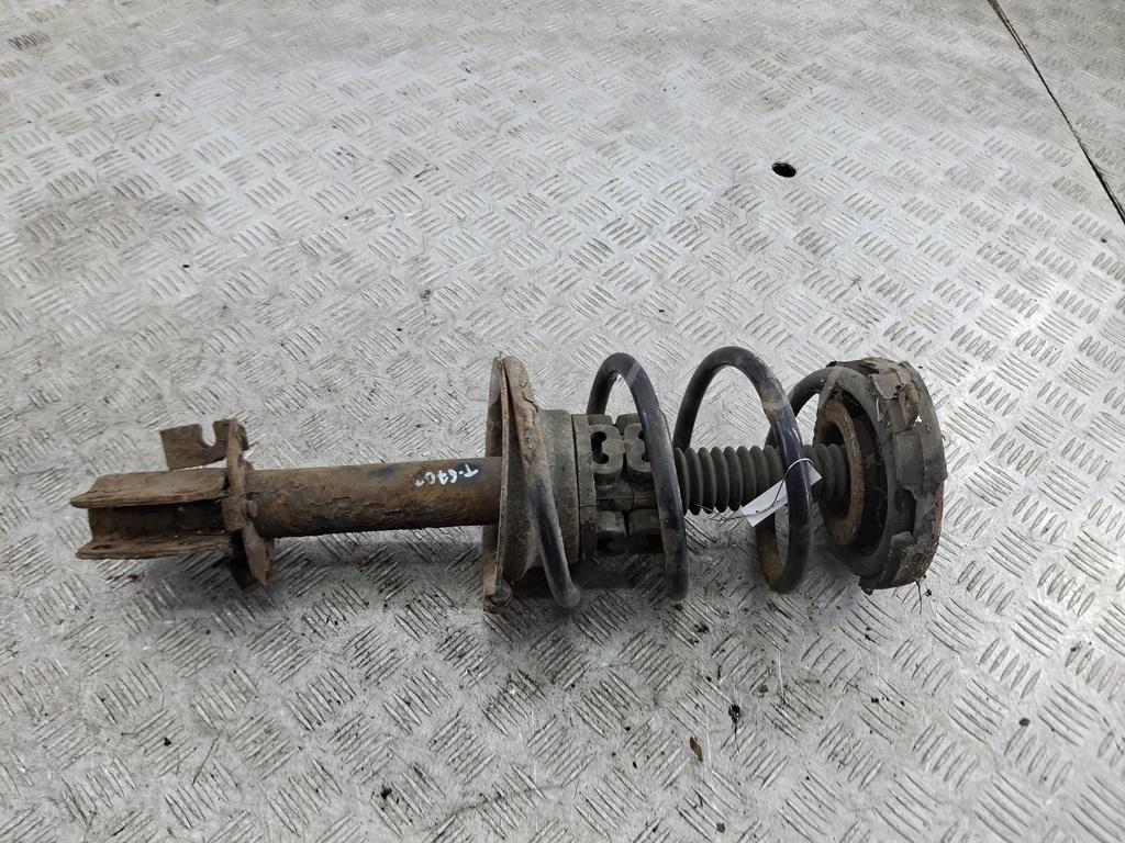 Амортизатор передний левый