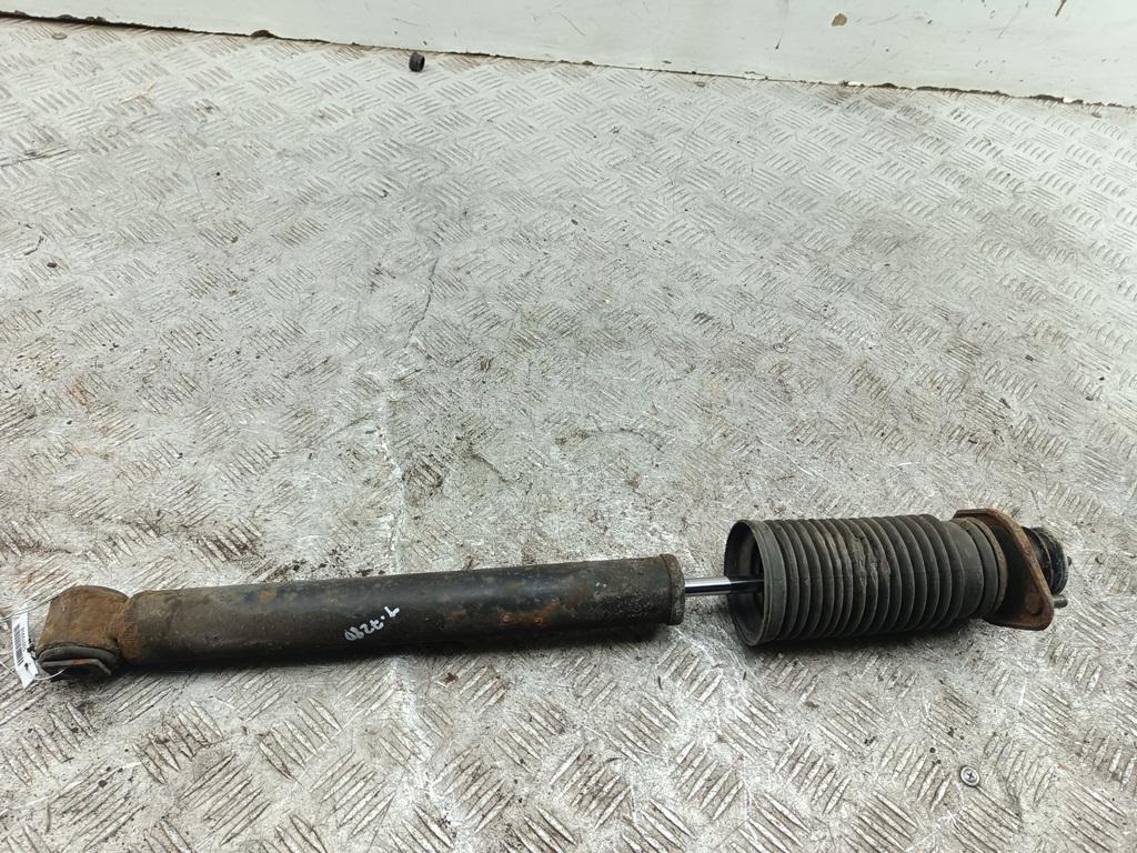 Амортизатор задний левый