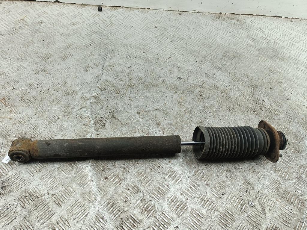 Амортизатор задний левый