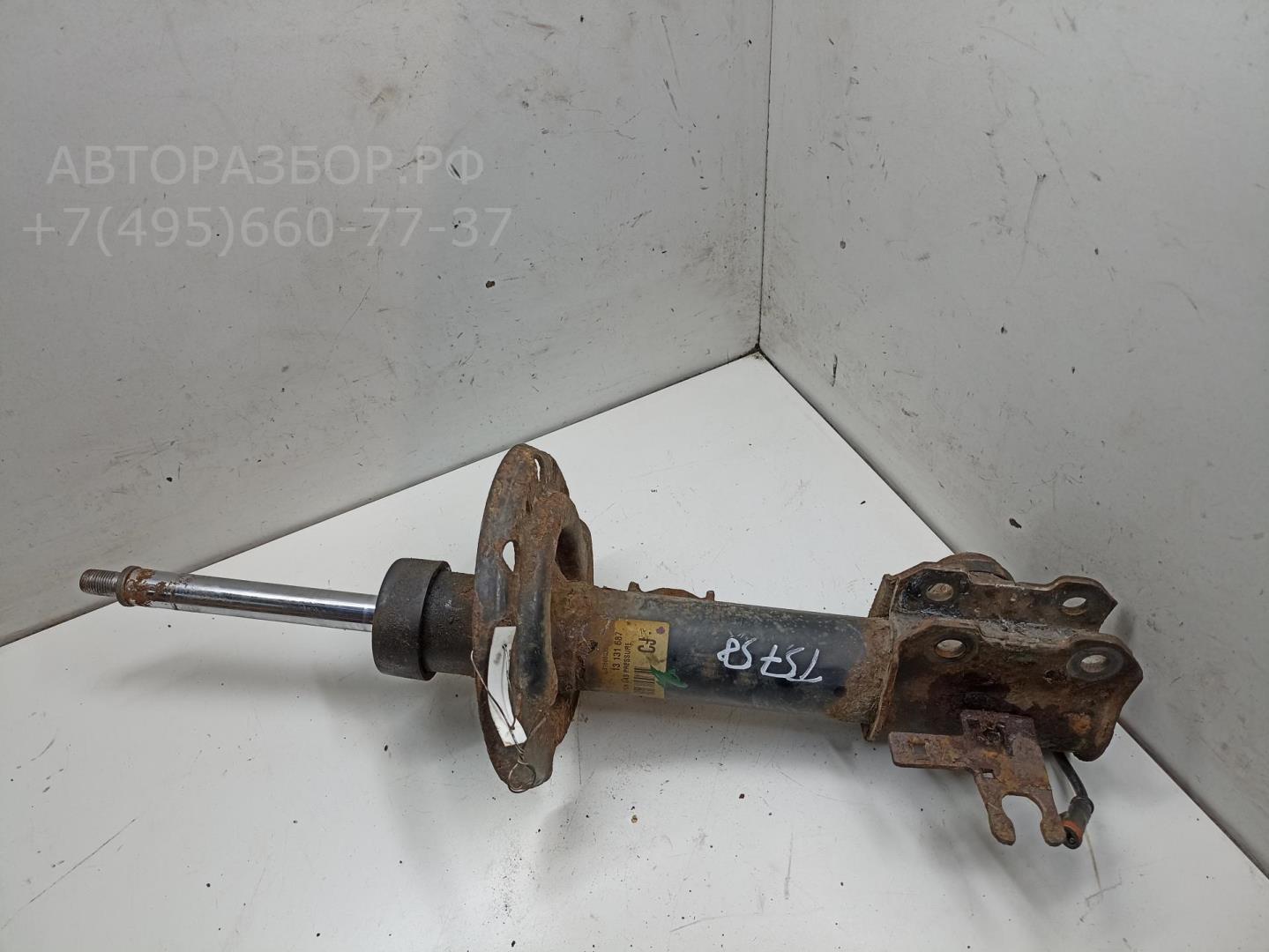 Амортизатор передний левый