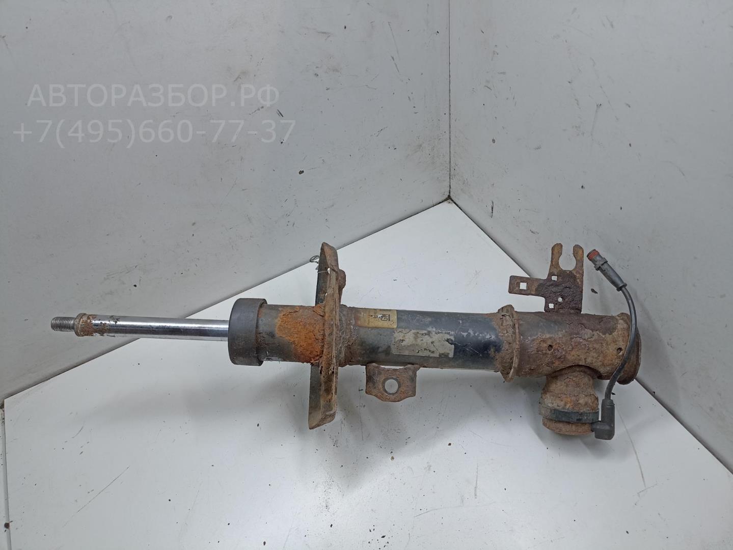 Амортизатор передний левый