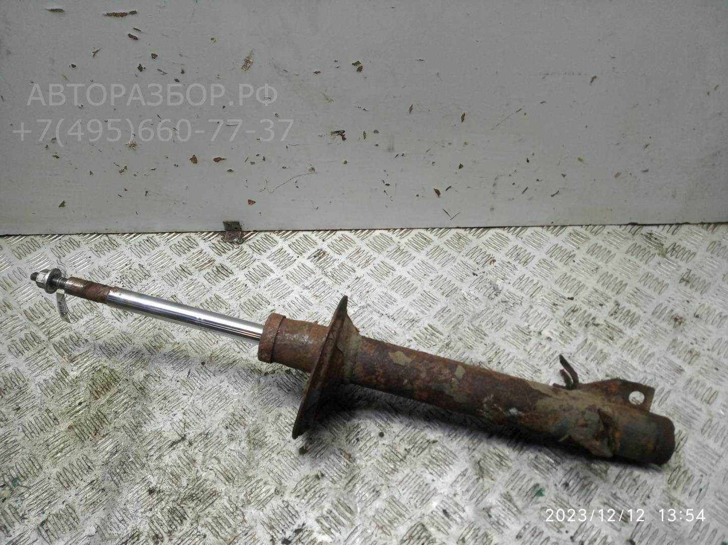 Амортизатор передний левый