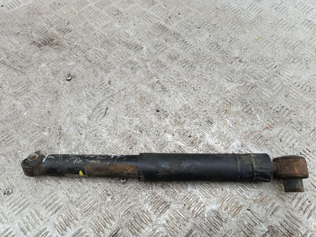 Амортизатор задний левый