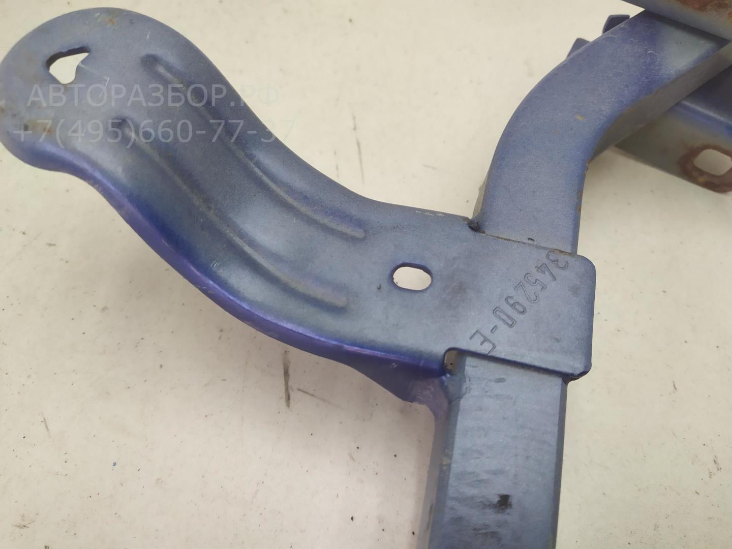 Петля крышки багажника