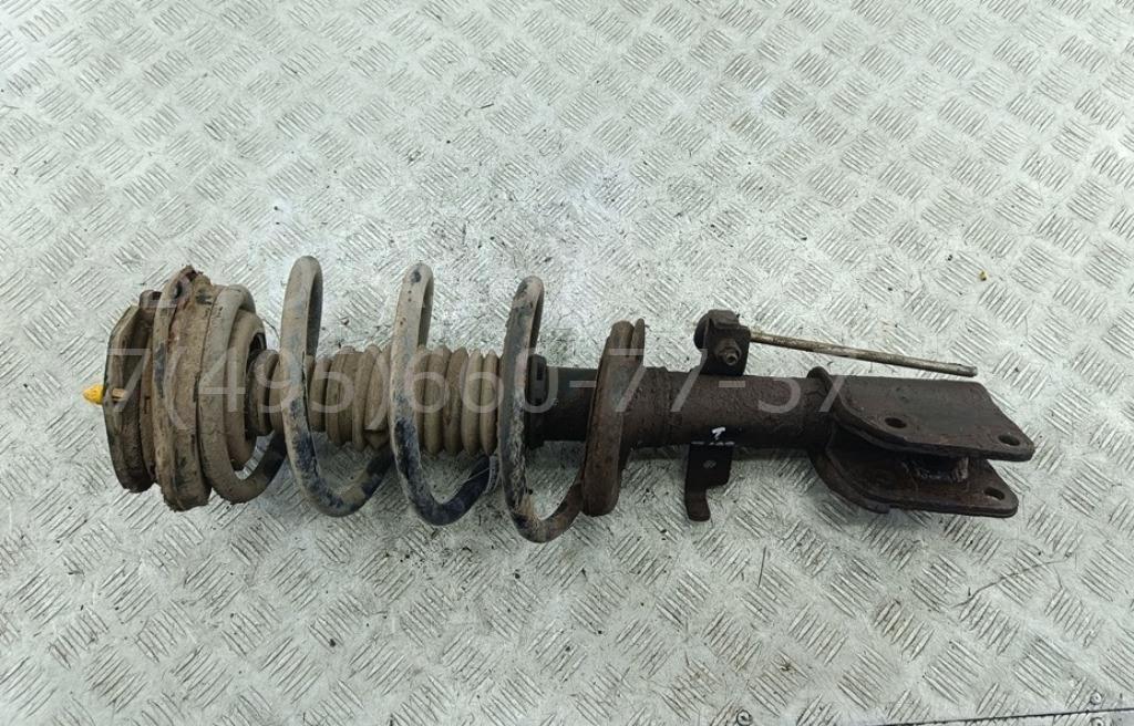 Амортизатор передний левый