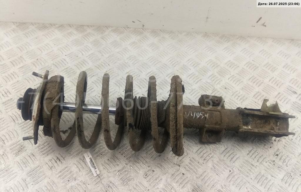 Амортизатор передний левый